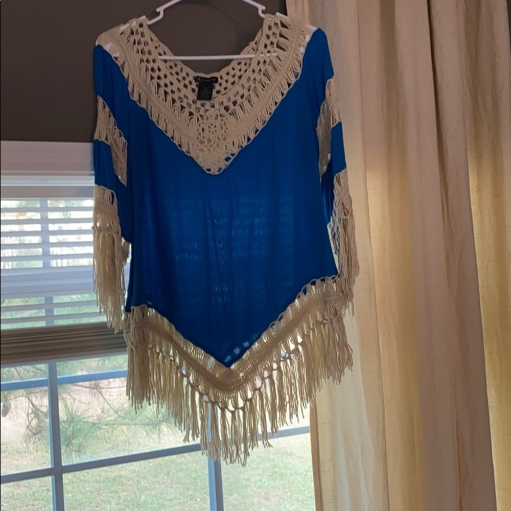 Blue and tan Shaw like shirt. Very pretty!